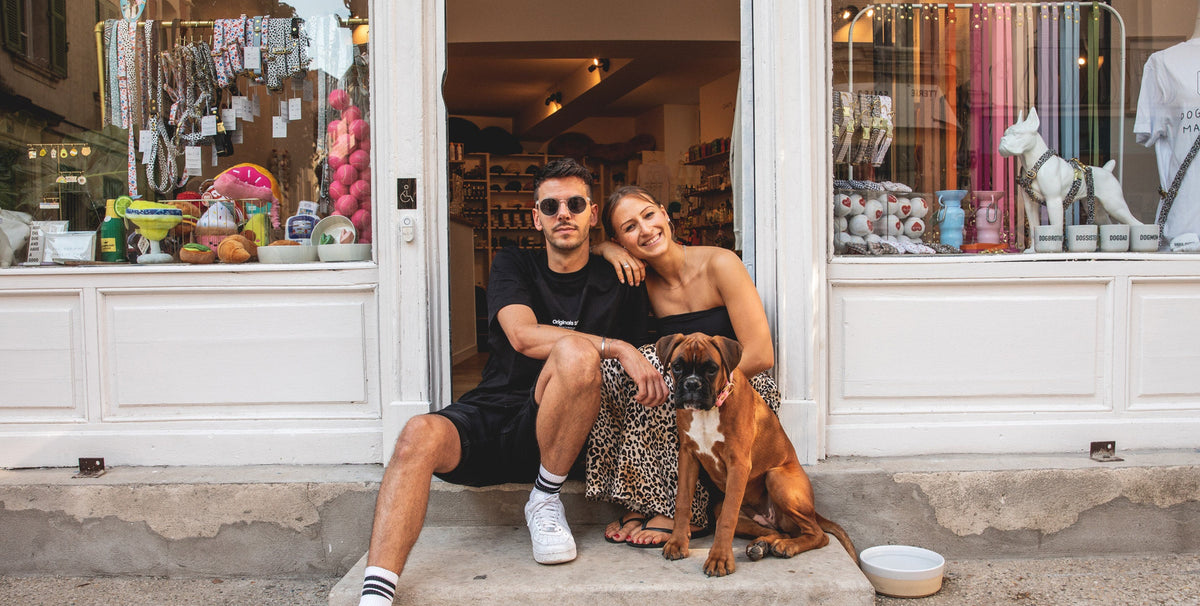 Camille and Arnaud outside the Pompon & Pets boutique in Avignon, with their boxer